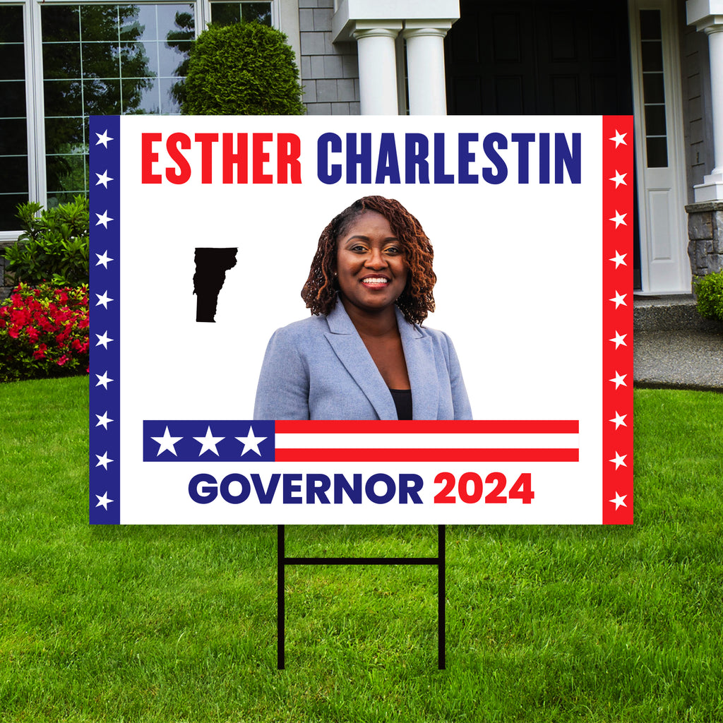 a political yard sign in front of a house