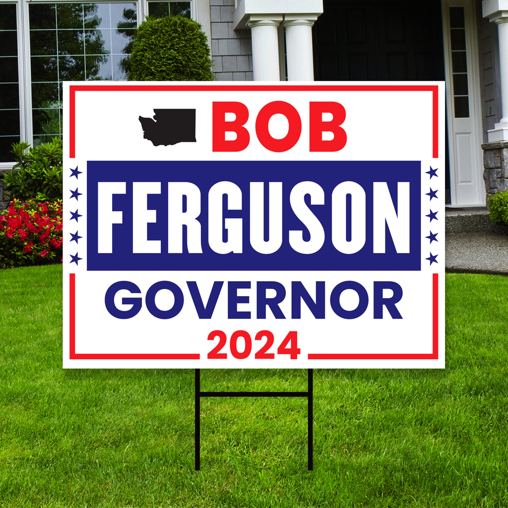 a political yard sign in front of a house