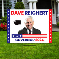 a political yard sign in front of a house