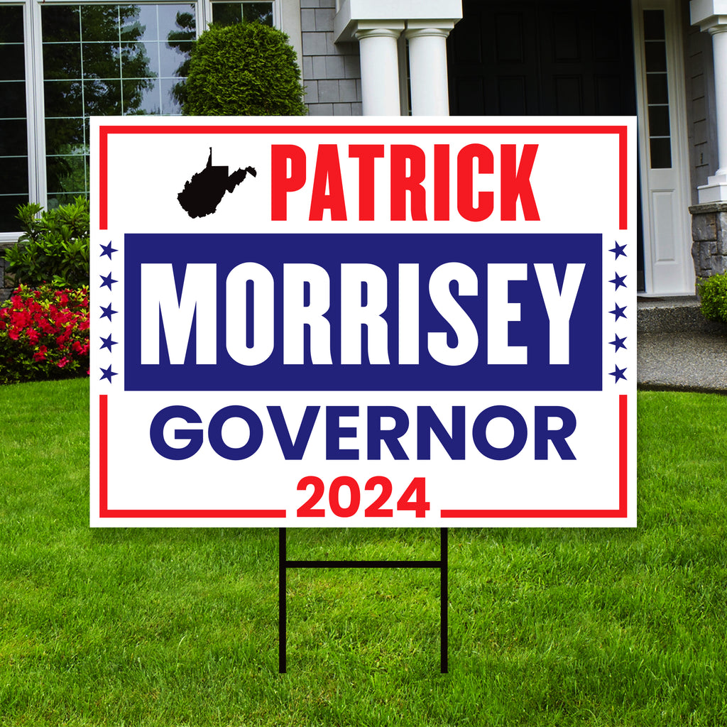 a political yard sign in front of a house