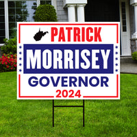 a political yard sign in front of a house