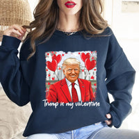 a woman wearing a trump is my valentine sweatshirt