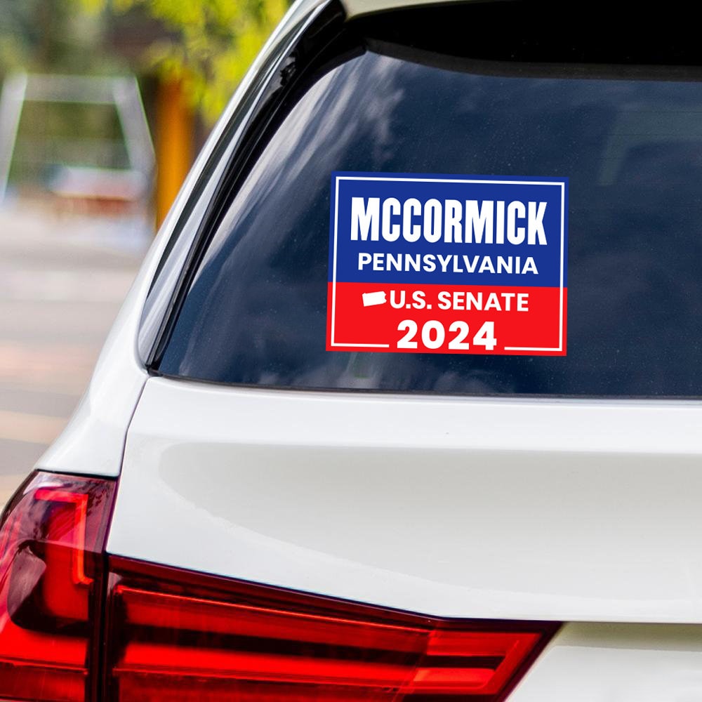 a car with a political sticker on it