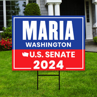 a real estate for sale sign in front of a house