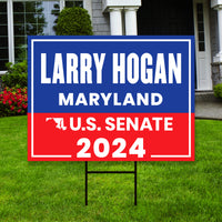 a political yard sign in front of a house