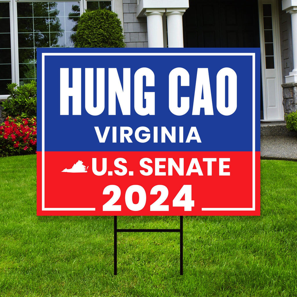 a political yard sign in front of a house